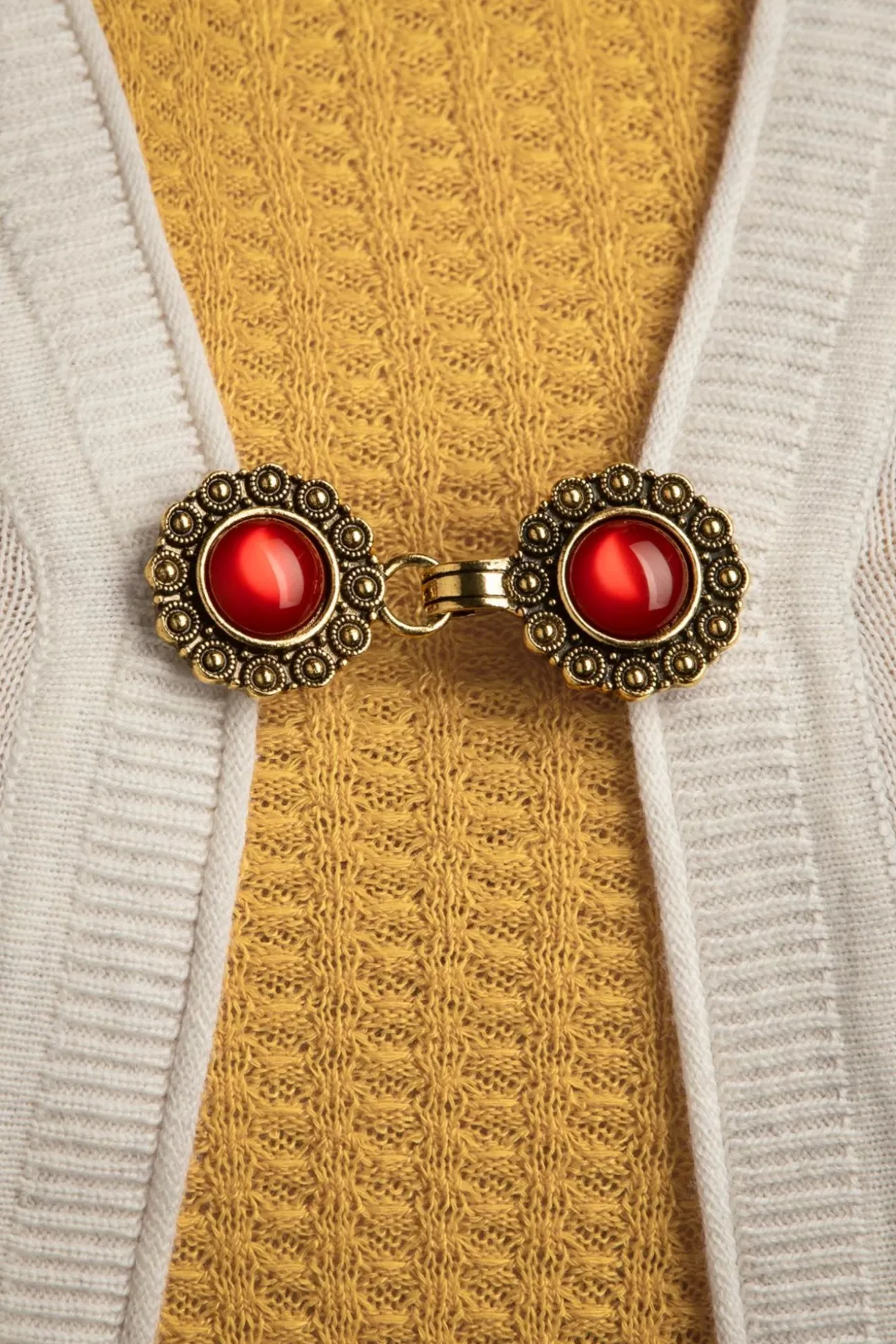 Vestclips In Goud En Rood